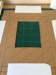 Jig with aperture cut for the lino blocks