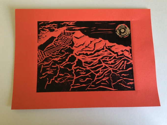 Montana Roja on red paper with gold tissue sun